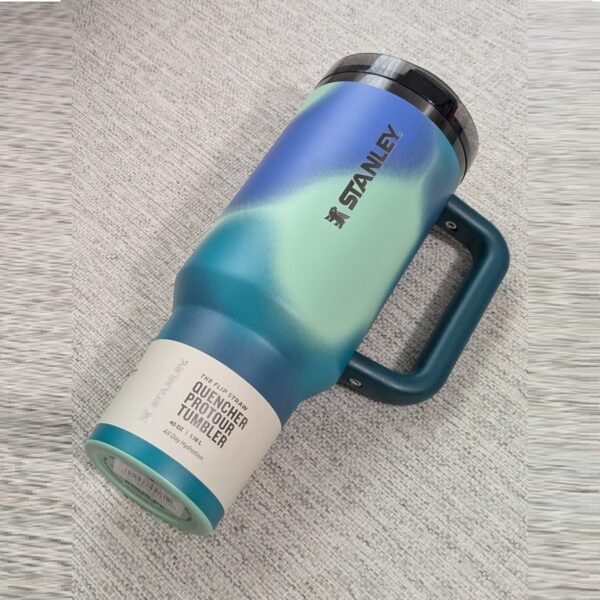 The New Quencher Pro Tour Flip Straw Tumbler | 40 OZ Coastal Teal Motion